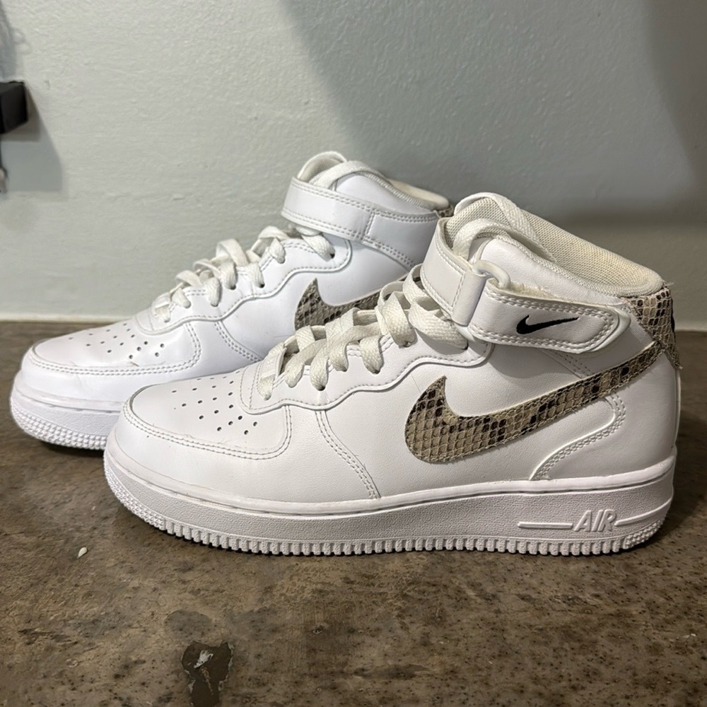White and snake print Nike AF1s